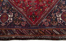 Close-up detail of 2000s Shiraz rug from Iran / Persia showing Wool weave