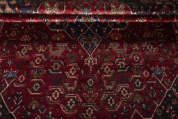 Corner detail of 1970s Shiraz rug showing border pattern and Wool pile