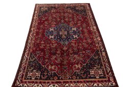 Surface texture of 1970s Shiraz rug with natural Wool and intricate pattern