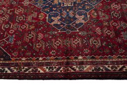 Full view of 1970s Shiraz rug from Iran / Persia, 260 × 166 cm in Red tones