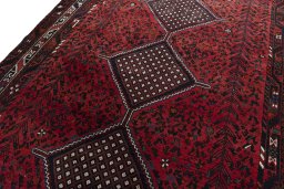 Backside of handmade 2000s Shiraz rug showing knot structure and weave density