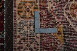 Surface texture of 2000s Shiraz rug with natural Wool and intricate pattern