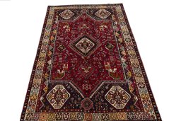 Surface texture of 2000s Shiraz rug with natural Wool and intricate pattern