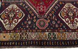 Close-up detail of 2000s Shiraz rug from Iran / Persia showing Wool weave