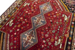 Backside of handmade 2000s Shiraz rug showing knot structure and weave density