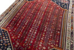 Backside of handmade 2000s Shiraz rug showing knot structure and weave density