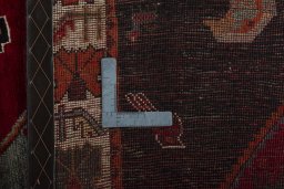 Backside of handmade 2000s Shiraz rug showing knot structure and weave density