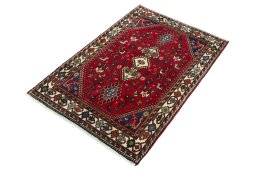 Corner detail of 2000s Shiraz rug showing border pattern and Wool pile