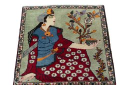 Surface texture of 2000s Shiraz rug with natural Wool and intricate pattern