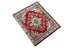 Corner detail of 2000s Shiraz rug showing border pattern and Wool pile
