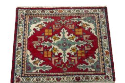 Surface texture of 2000s Shiraz rug with natural Wool and intricate pattern