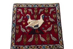 Surface texture of 2000s Shiraz rug with natural Wool and intricate pattern