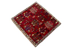 Corner detail of 2000s Shiraz rug showing border pattern and Wool pile