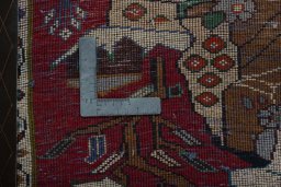 Backside of handmade 2000s Shiraz rug showing knot structure and weave density