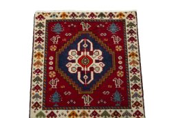 Surface texture of 2000s Shiraz rug with natural Wool and intricate pattern
