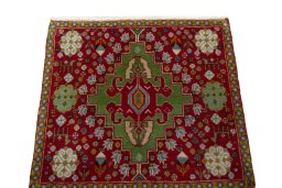Surface texture of 2000s Shiraz rug with natural Wool and intricate pattern