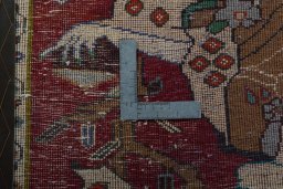 Backside of handmade 2000s Shiraz rug showing knot structure and weave density