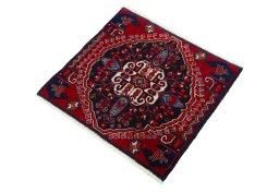 Corner detail of 2000s Shiraz rug showing border pattern and Wool pile