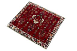 Corner detail of 2000s Shiraz rug showing border pattern and Wool pile