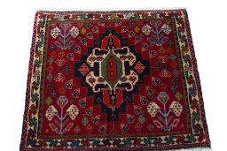 Surface texture of 2000s Shiraz rug with natural Wool and intricate pattern