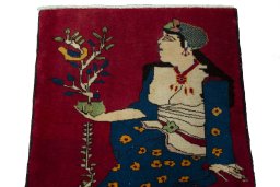 Surface texture of 2000s Shiraz rug with natural Wool and intricate pattern
