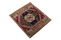 Corner detail of 2000s Shiraz rug showing border pattern and Wool pile
