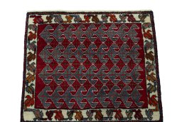 Surface texture of 2000s Shiraz rug with natural Wool and intricate pattern