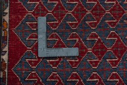 Backside of handmade 2000s Shiraz rug showing knot structure and weave density