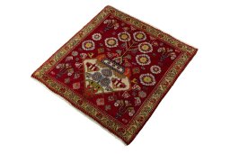 Corner detail of 2000s Shiraz rug showing border pattern and Wool pile