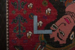 Backside of handmade 2000s Shiraz rug showing knot structure and weave density