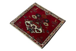 Corner detail of 2000s Shiraz rug showing border pattern and Wool pile