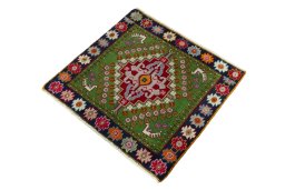 Corner detail of 2000s Shiraz rug showing border pattern and Wool pile