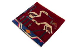 Corner detail of 2000s Shiraz rug showing border pattern and Wool pile