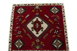 Surface texture of 2000s Shiraz rug with natural Wool and intricate pattern