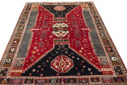 Surface texture of 2000s Shiraz rug with natural Wool and intricate pattern