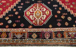 Close-up detail of 2000s Shiraz rug from Iran / Persia showing Wool weave