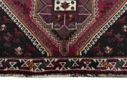 Central medallion detail of 2000s Shiraz rug from Iran / Persia