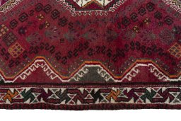 Close-up detail of 2000s Shiraz rug from Iran / Persia showing Wool weave