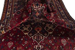 Close-up detail of 2000s Shiraz rug from Iran / Persia showing Wool weave