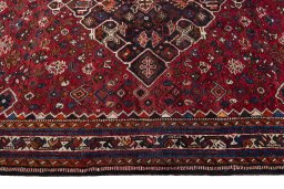 Full view of 2000s Shiraz rug from Iran / Persia, 264 × 173 cm in Red tones