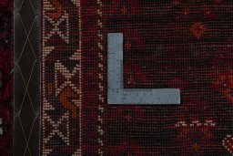 Corner detail of 2000s Shiraz rug showing border pattern and Wool pile