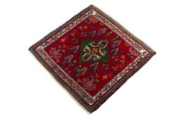Corner detail of 2000s Shiraz rug showing border pattern and Wool pile