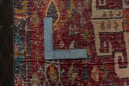 Backside of handmade 2000s Shiraz rug showing knot structure and weave density