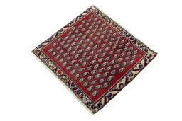 Corner detail of 2000s Shiraz rug showing border pattern and Wool pile