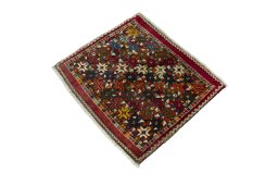Corner detail of 2000s Shiraz rug showing border pattern and Wool pile