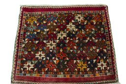 Surface texture of 2000s Shiraz rug with natural Wool and intricate pattern