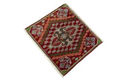 Corner detail of 2000s Shiraz rug showing border pattern and Wool pile