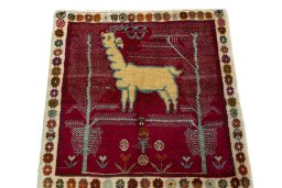 Surface texture of 2000s Shiraz rug with natural Wool and intricate pattern