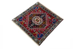 Corner detail of 2000s Shiraz rug showing border pattern and Wool pile