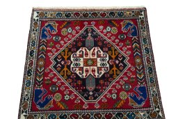 Surface texture of 2000s Shiraz rug with natural Wool and intricate pattern